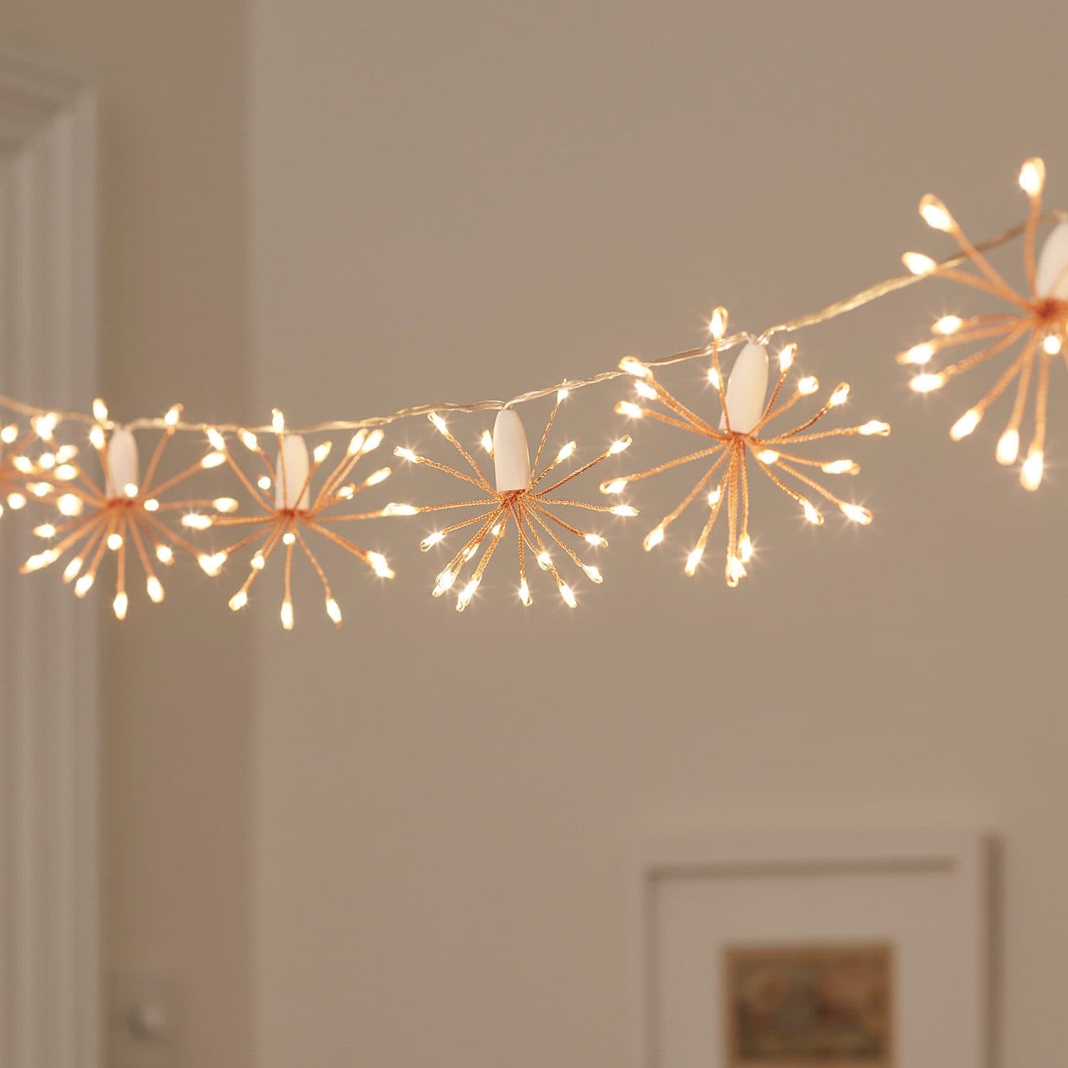 Lights4fun LED-Lichterkette 15er Sternenbälle Roségold