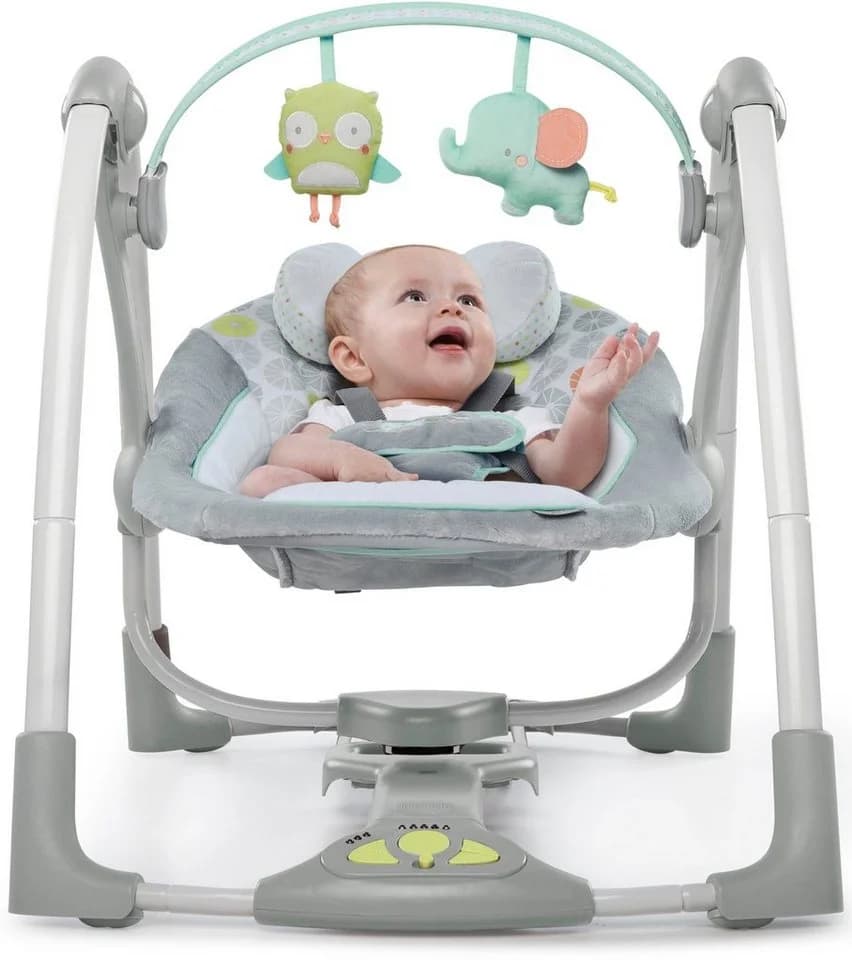 Babyschaukel aus Plüsch und Polster in Pastelltönen