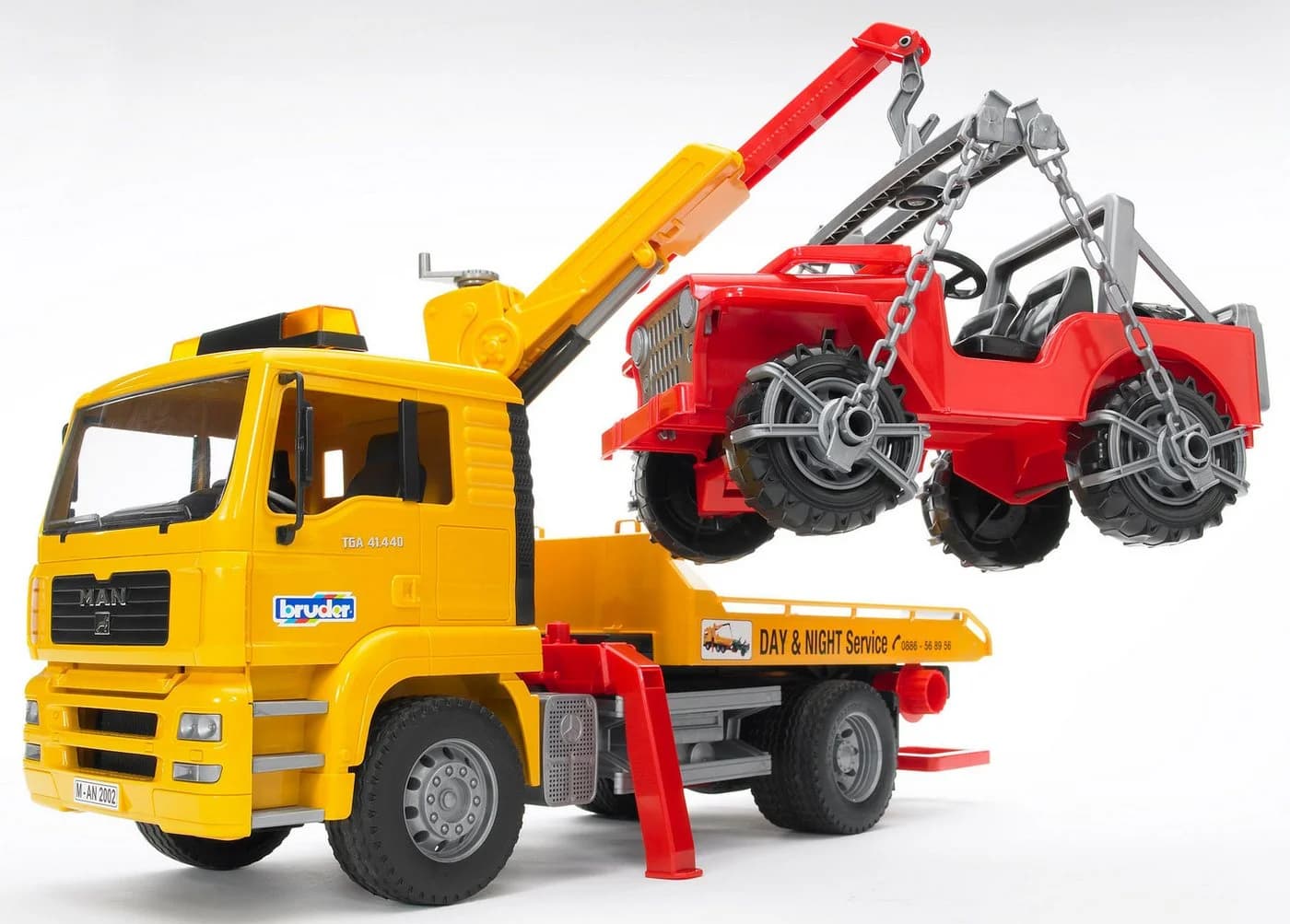Bruder MAN TGA Abschlepp-LKW mit Geländewagen 26 cm