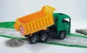 Bruder Spielzeug-Kipper MAN TGA LKW 45 cm Grün/Orange mit Kippmulde Bild 3