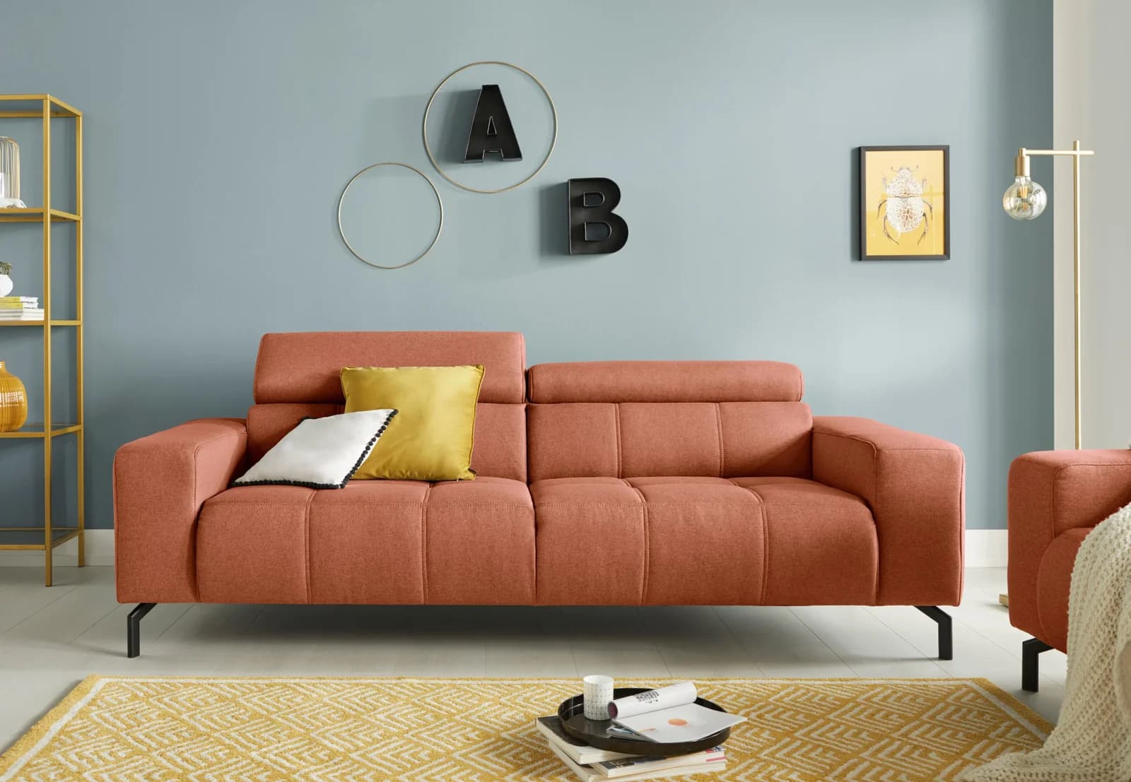 DOMO COLLECTION Cunelli 2,5-Sitzer Sofa Orange mit verstellbaren Kopfteilen