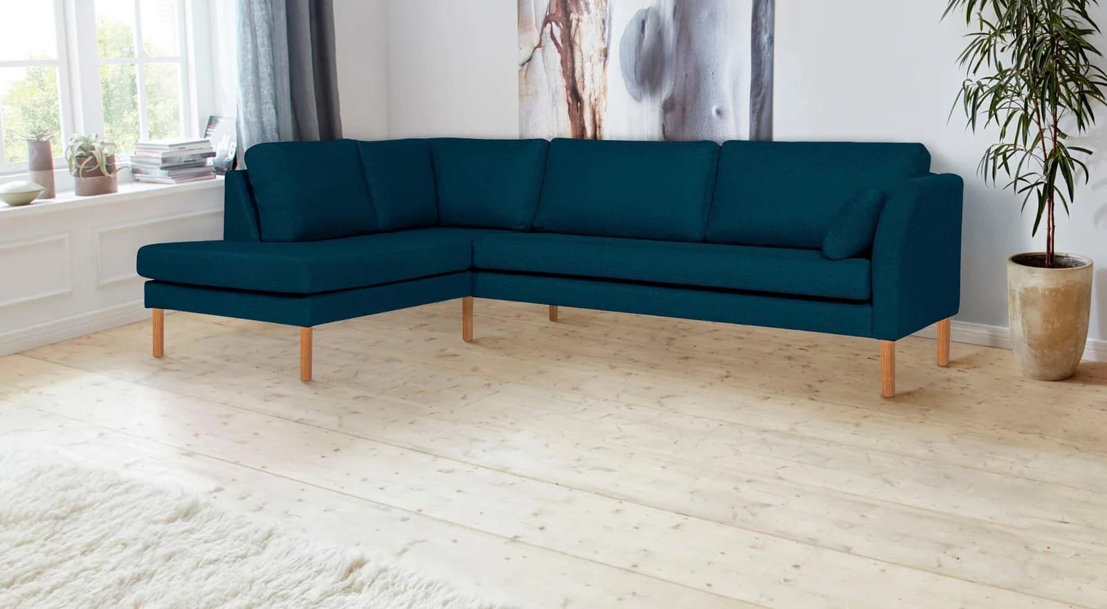 Ecksofa ANDAS Grenzda L-Form Blau mit Holzfüßen