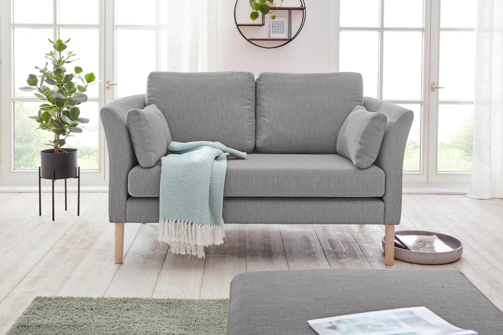 ANDAS 2-Sitzer Sofa "Grenzda" hellgrau mit Massivholzfüßen