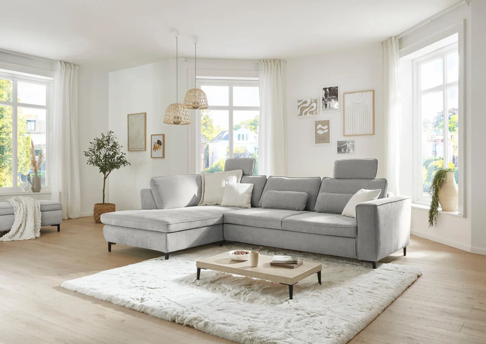 Ecksofa DIE PLANBAR L-Form mit Schlaffunktion und Kopfstützen grau