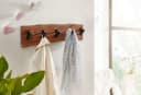 FINEBUY Wandgarderobe Akazie Massivholz Baumkante mit schwarzen Haken Bild 1