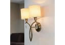 Licht-Erlebnisse KENZIE Wandleuchte 2-flammig Messing Antik Stoff Metall Bild 1