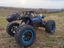 BruKa RC Auto Robuster Geländewagen X-FIGHTER 4x4 Allradantrieb Orange/Blau Bild 4