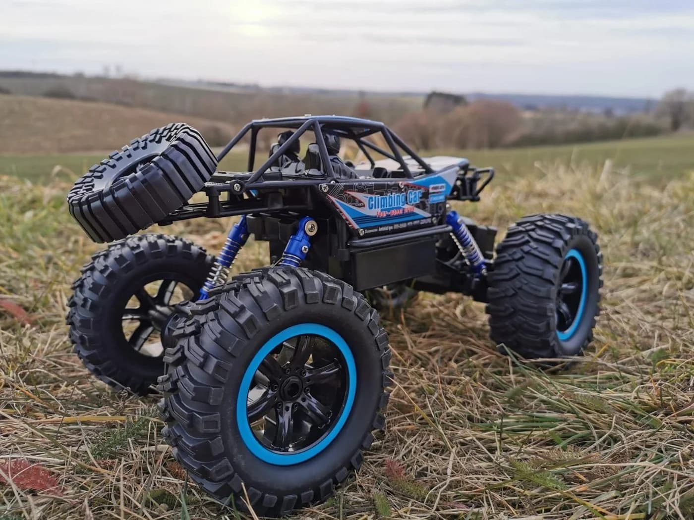 BruKa RC Auto Robuster Geländewagen X-FIGHTER 4x4 Allradantrieb Orange/Blau - Bild 4