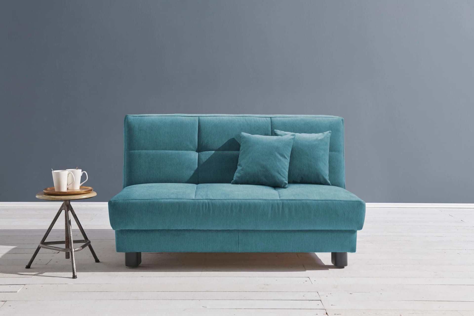 ELL + ELL Schlafsofa Tilda Petrol 160 cm mit Zierkissen