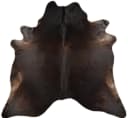 KUHFELL online & NOMAD Fellteppich Dunkelbraun Schwarz Rinderfell Bild 1