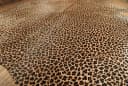 KUHFELL online & NOMAD Fellteppich Leoparden-Optik Braun Schwarz Beige Bild 1