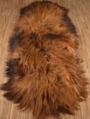 KUHFELL NOMAD Fellteppich Island Lammfell 180x60 cm Rotbraun Bild 1