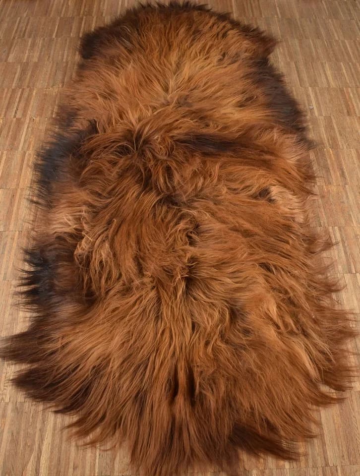KUHFELL NOMAD Fellteppich Island Lammfell 180x60 cm Rotbraun