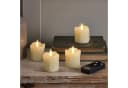 Lights4fun LED-Teelichter 4er Set TruGlow® Echtwachs mit Fernbedienung Bild 4