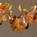 Lights4fun LED-Herbstgirlande 1,8 m mit Eichenlaub Grün/Orange Bild 1