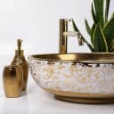 wohnwerk.idee Aufsatzwaschbecken Margot Schwarz Weiß Türkis Gold Orientalisch Bild 1