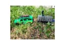 Toys Amsterdam Land Rover Dino Transporter Modellauto mit Dinosaurier Bild 2