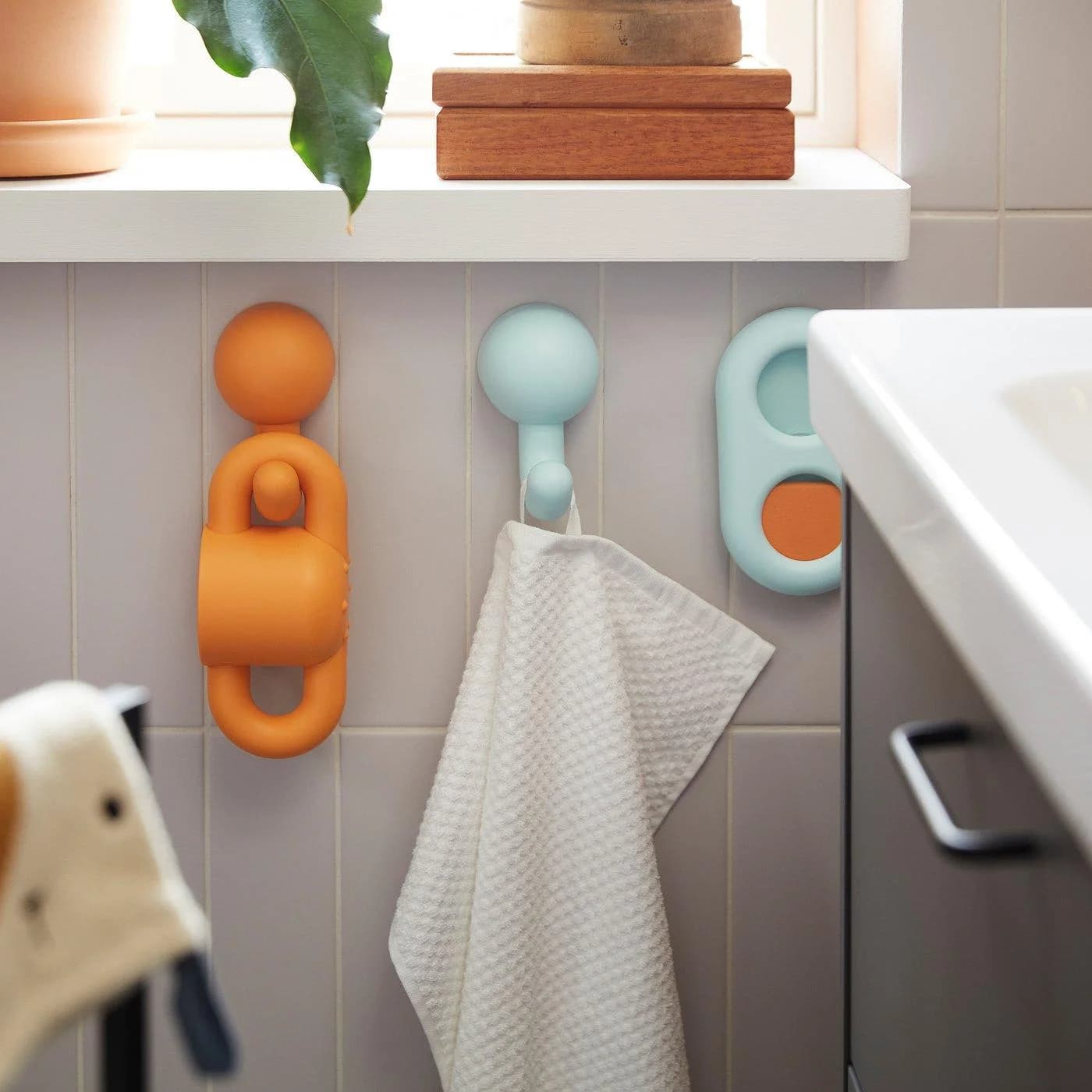 IKEA HUMLESJÖN Haken mit Saugnapf Orange/Türkis