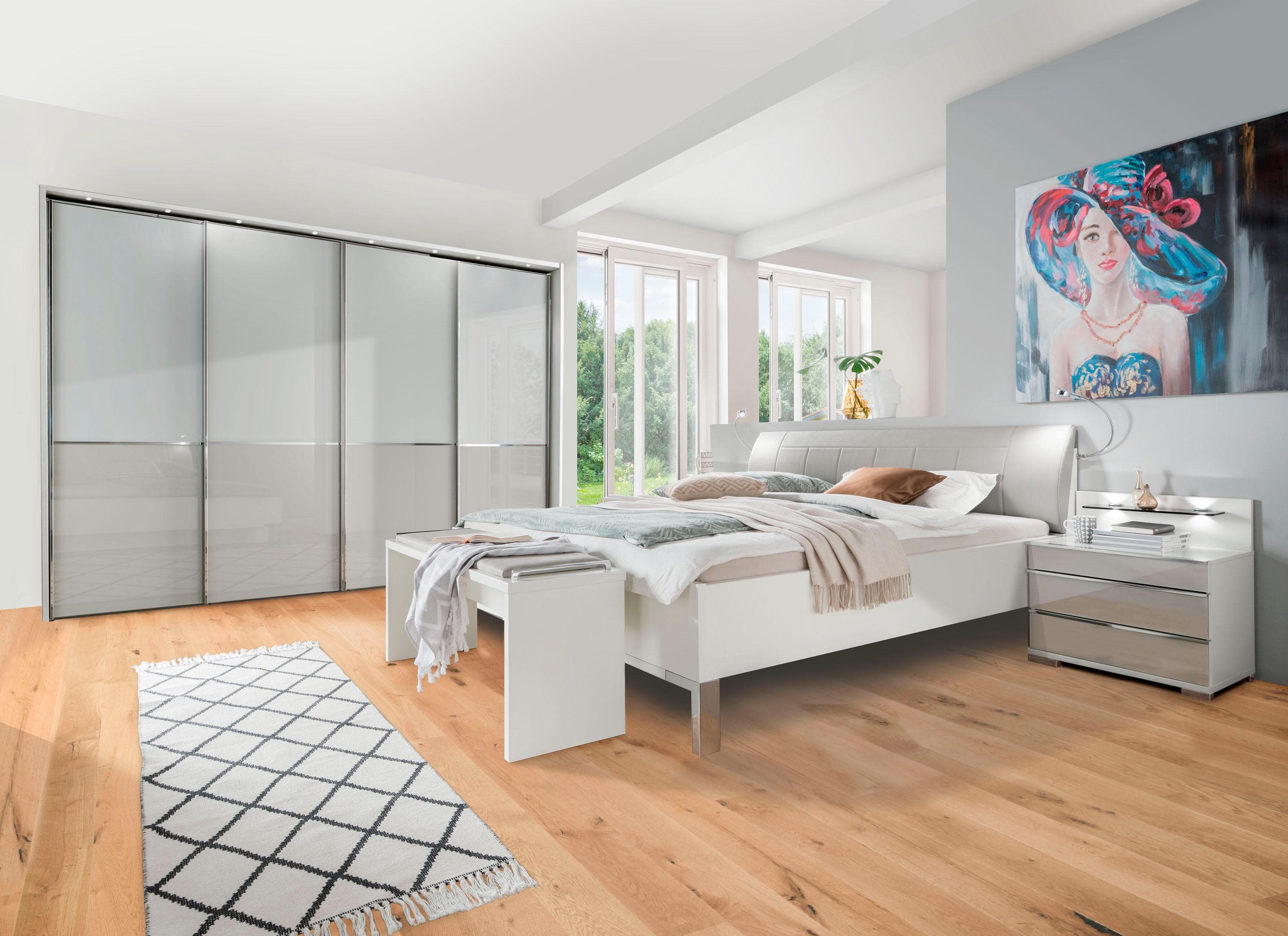 Gepolsterte Bettkopf-Designbett made in Germany - Chromfüße