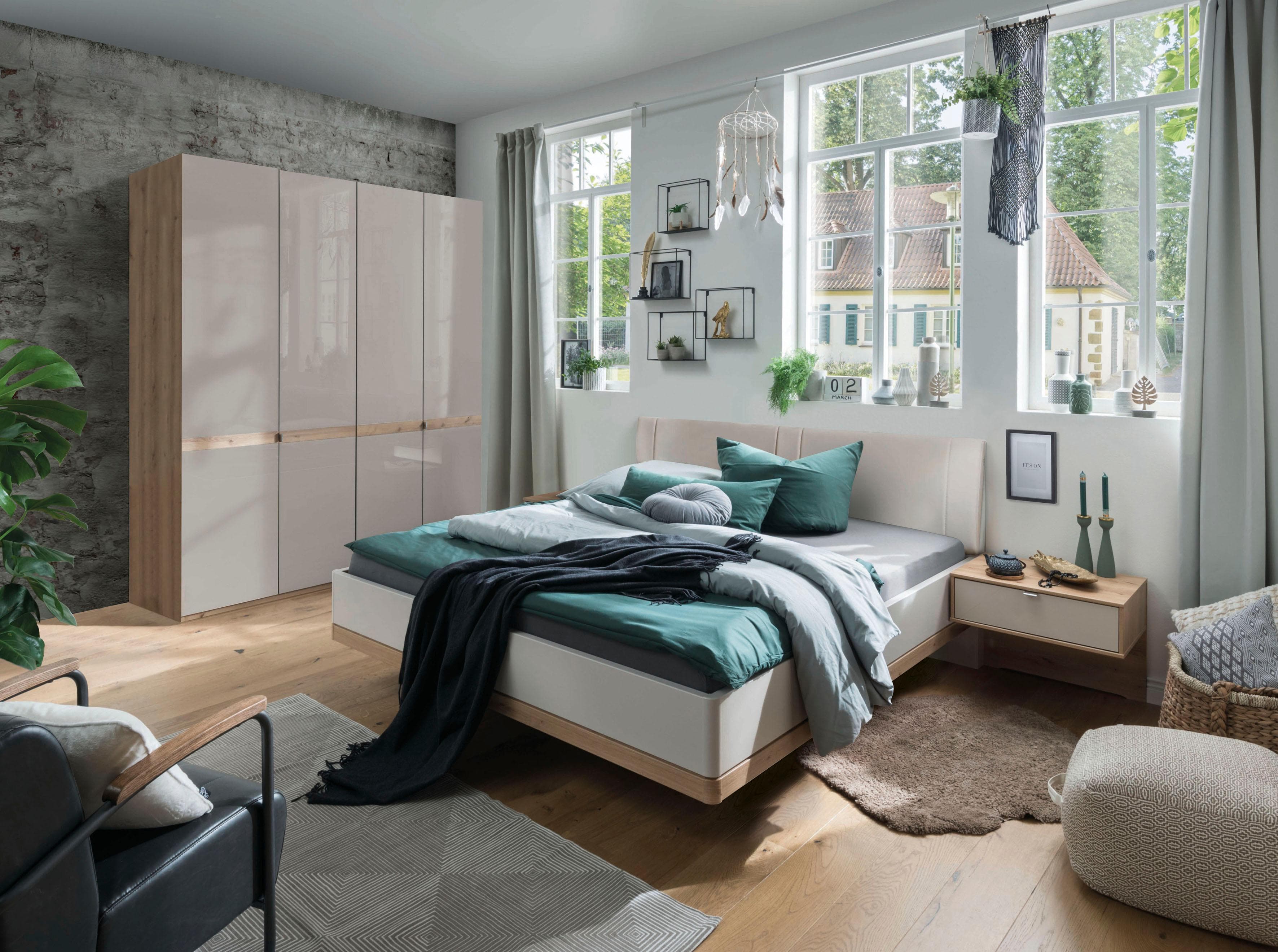 Schmaler Drehtürenschrank mit Bauchbinde