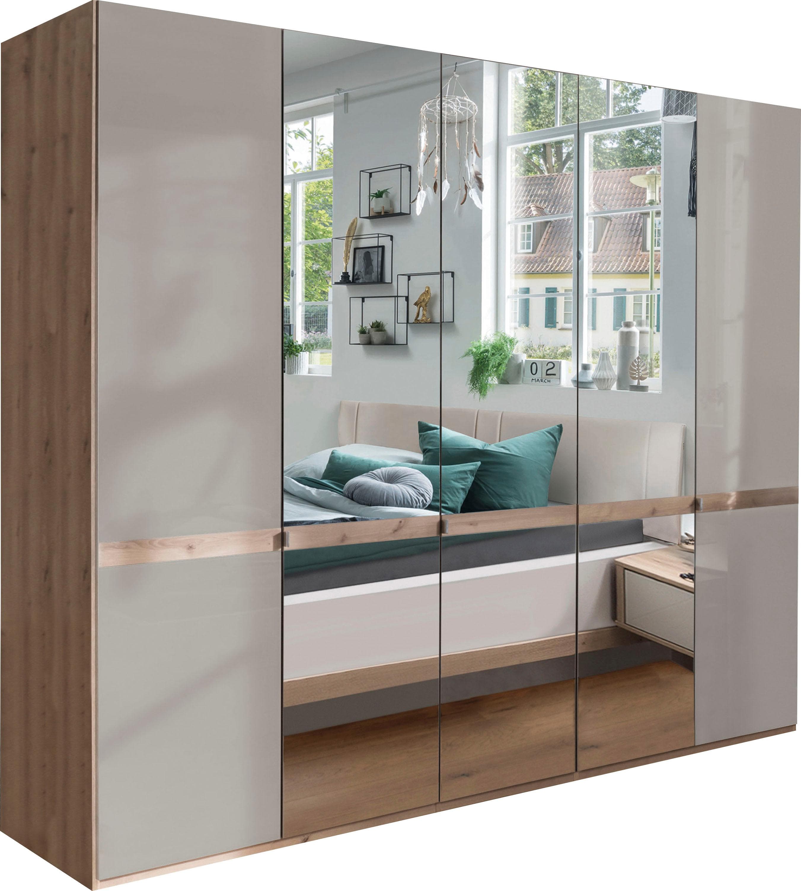 Drehtürenschrank mit Spiegelfront und dezenter Bauchbinde