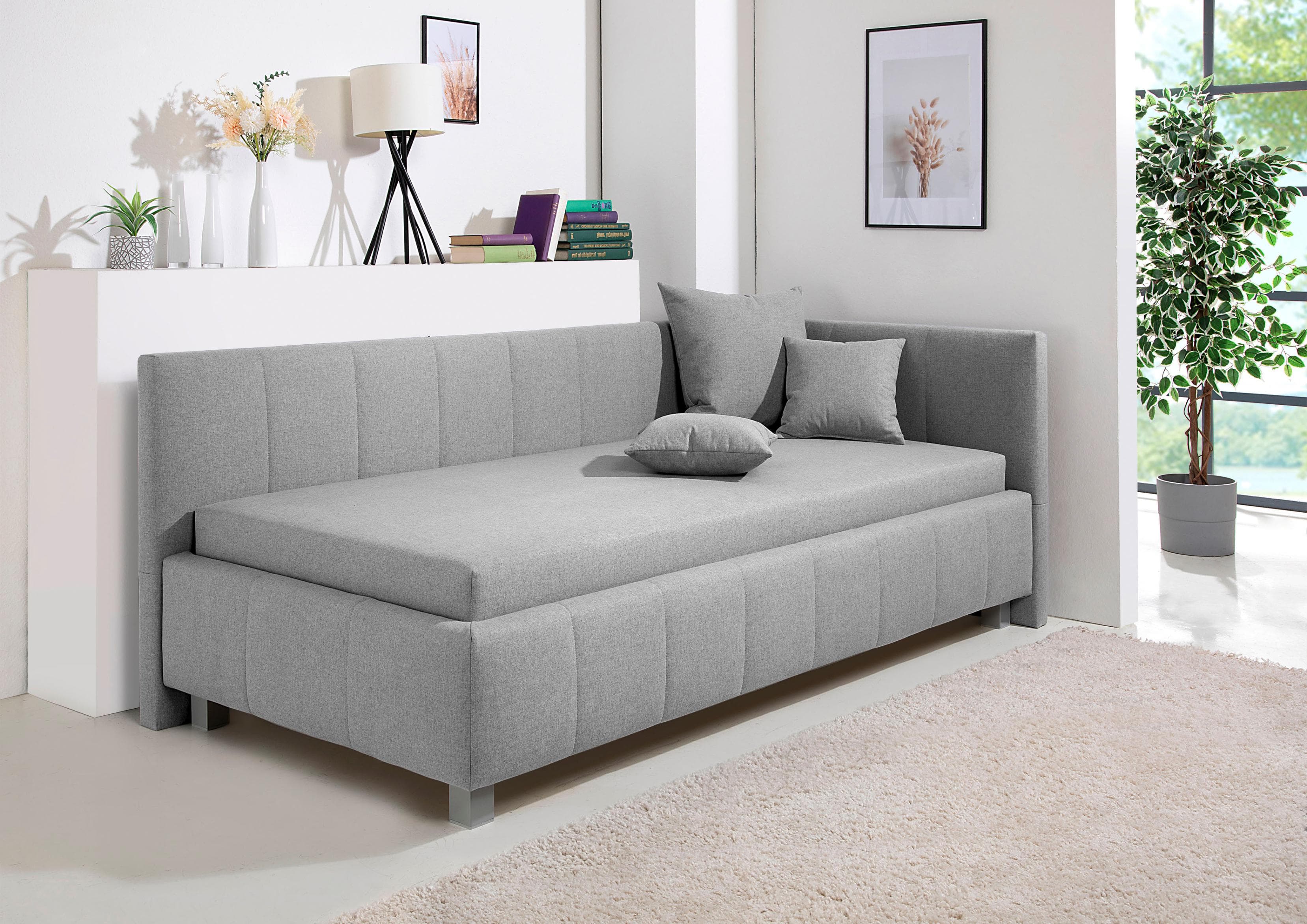 Polsterliege mit Kopfteil und Bettkasten - Federkern oder Bonell