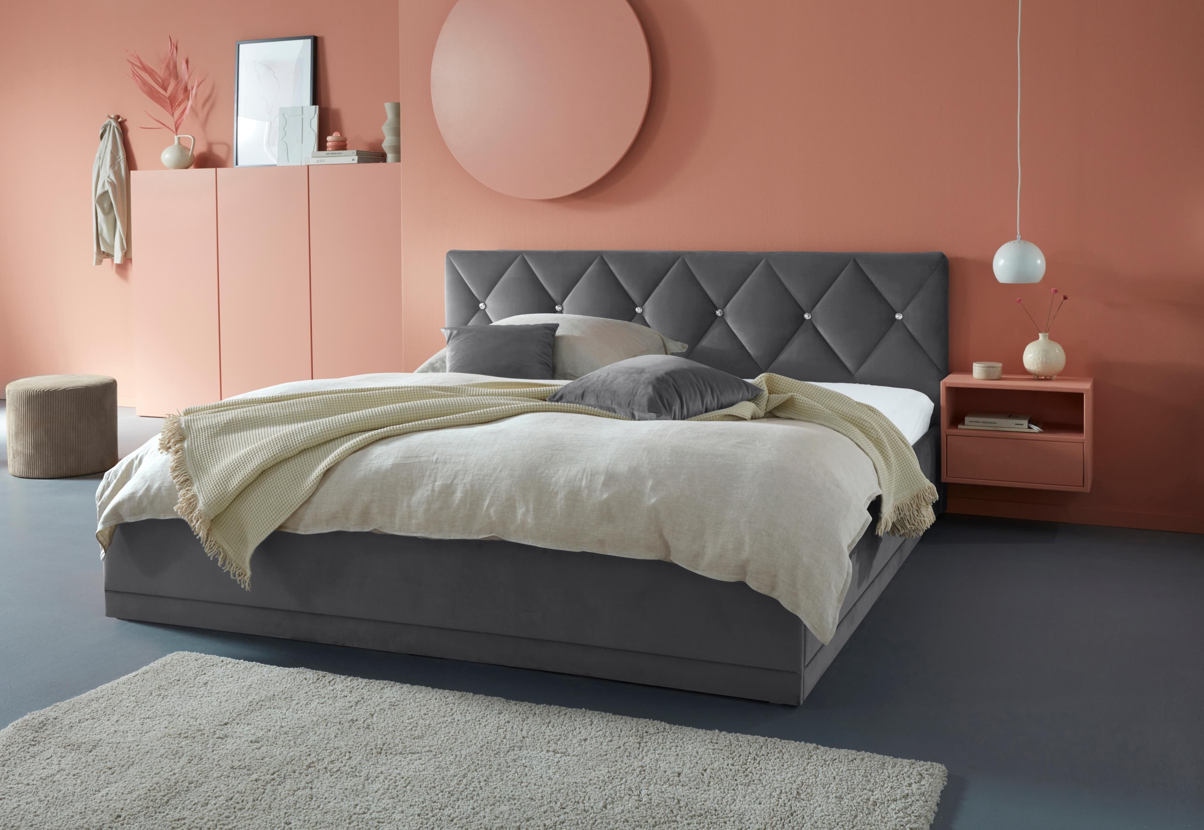 Polsterbett mit Bettkasten und Strass-Knopfheftung