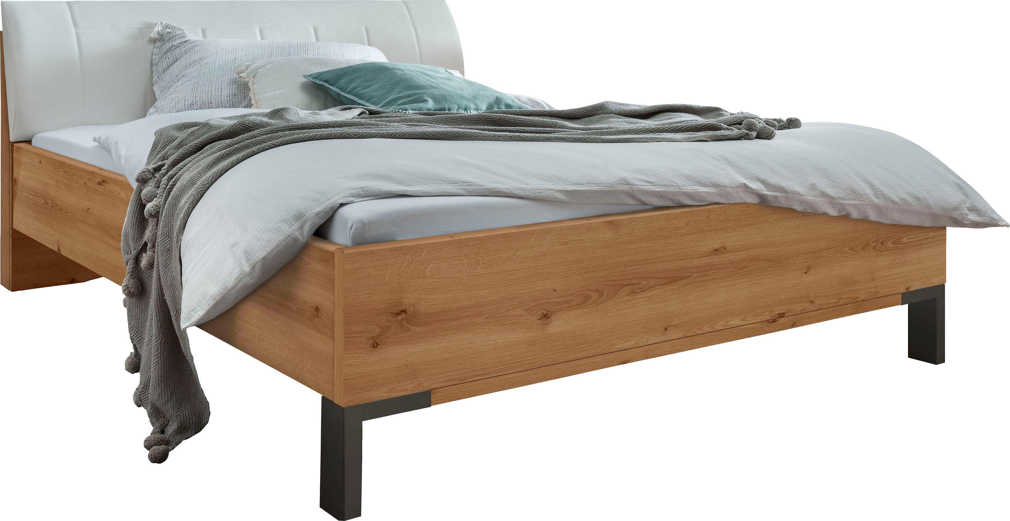 Komfortables Futonbett mit gepolstertem Kopfteil