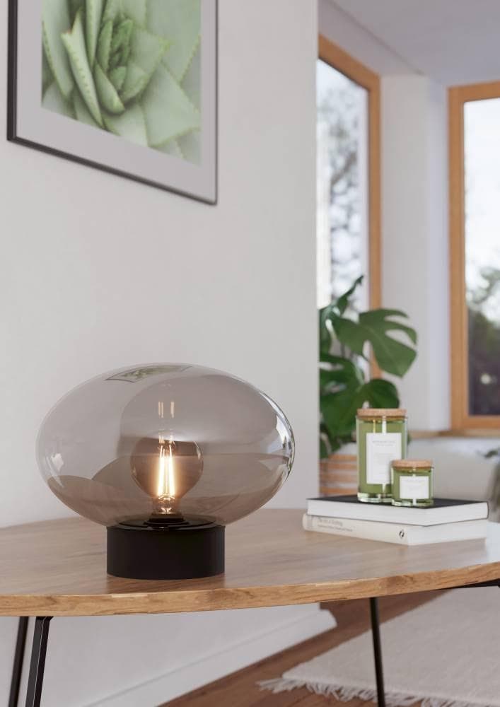 Minimalistische Tischleuchte aus Stahl und Glas