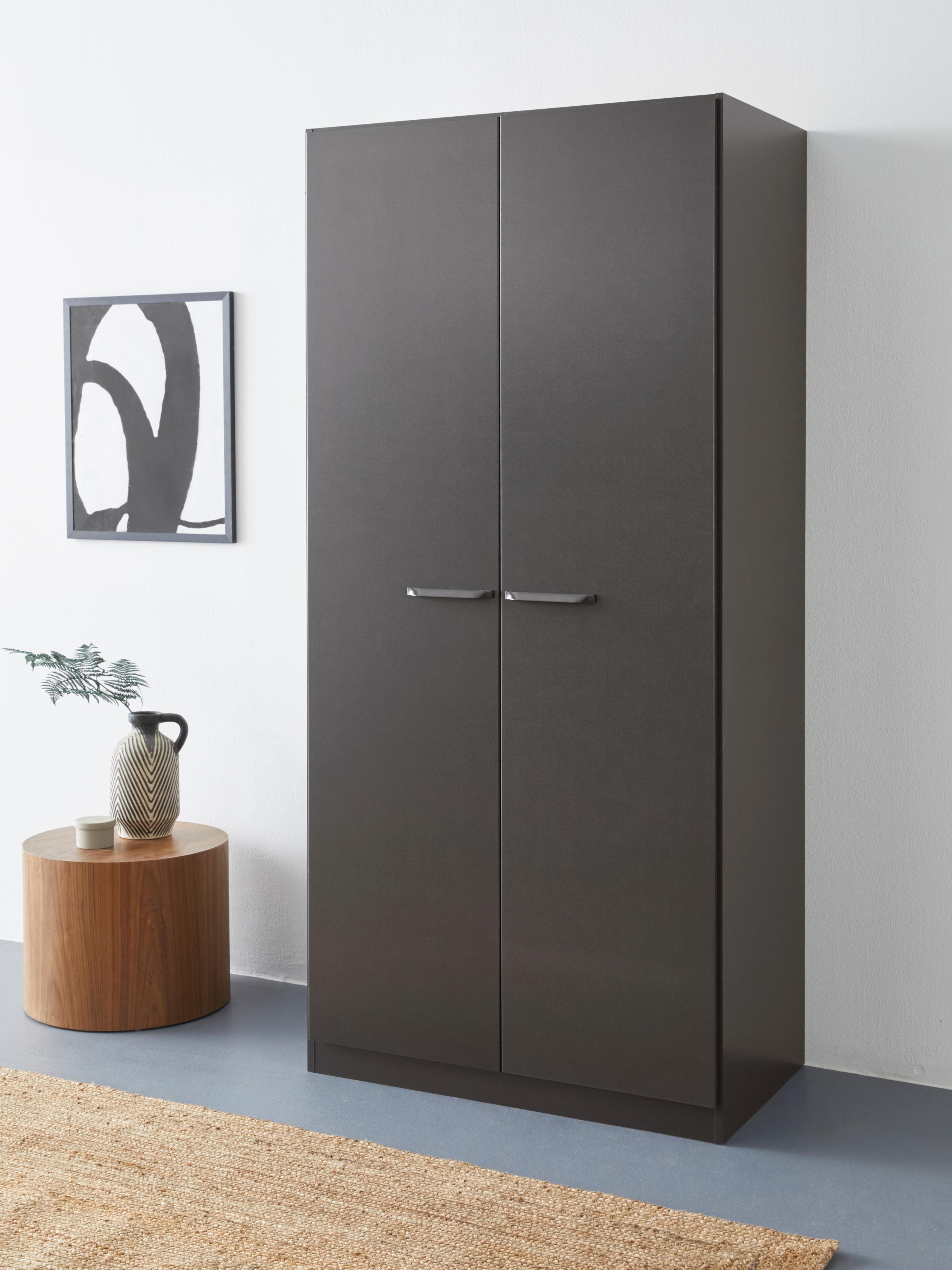 Drehtürenschrank mit Wäscheboxen & extra Fachböden