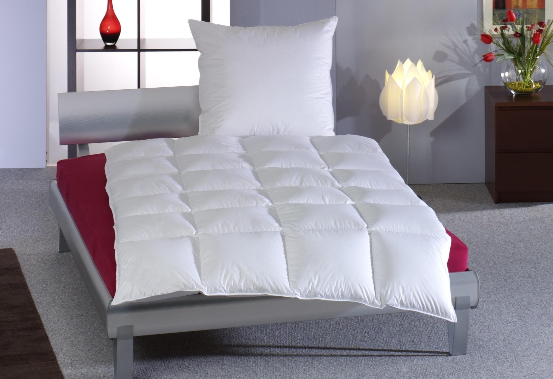 Haeussling Daunenbettdecke Swiss Royal: Ganzjahresdecke aus Baumwolle