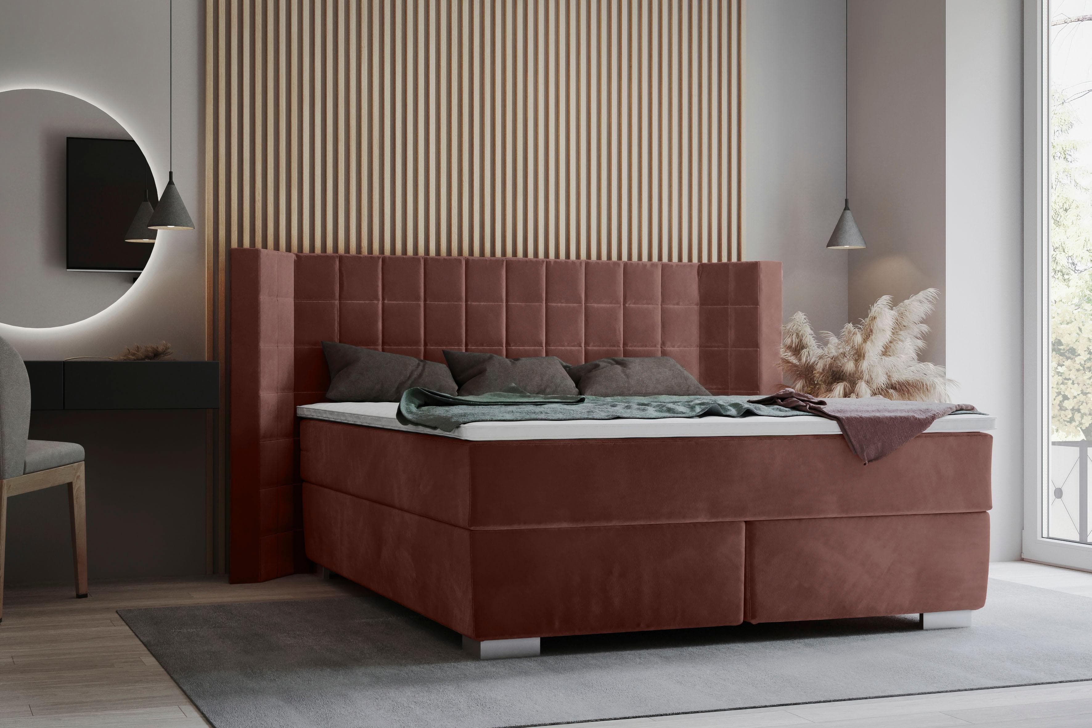 Boxspringbett mit eleganter Steppung und geflügeltem Kopfteil
