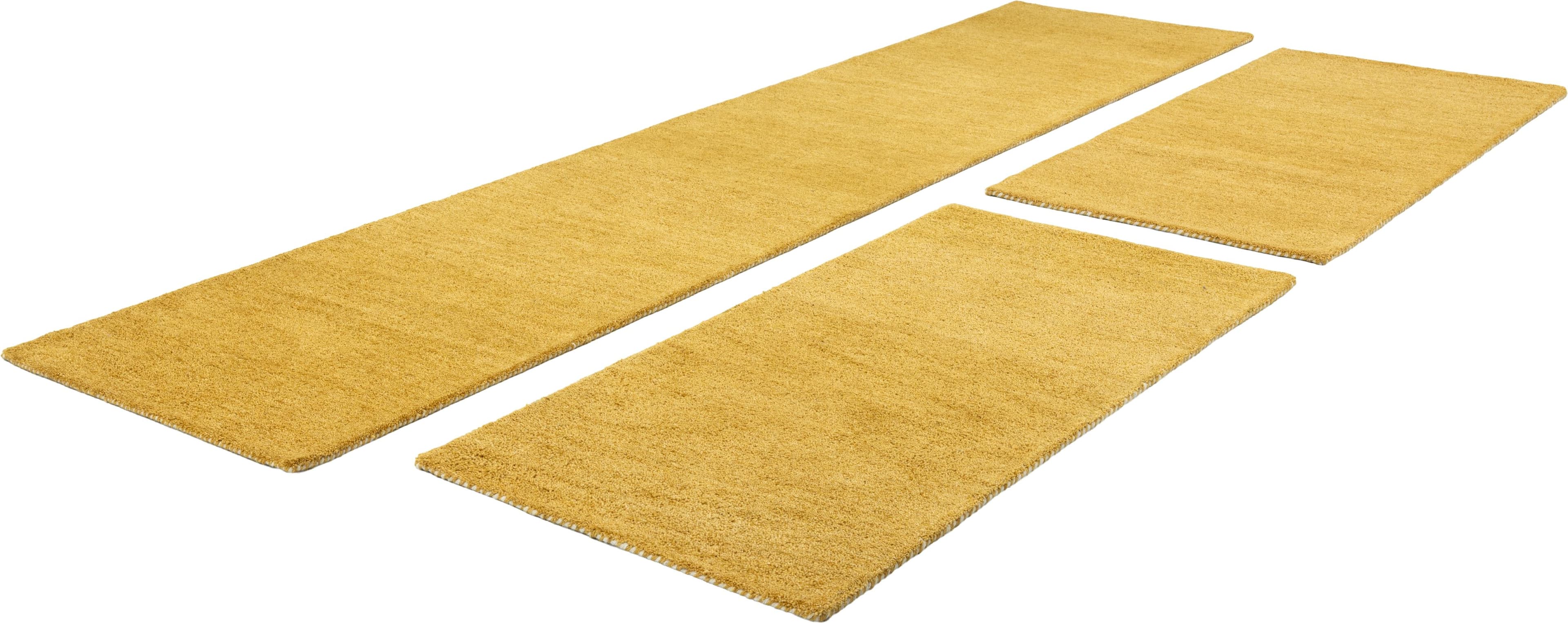 THEKO Gabbett Bettumrandung 100% Wolle Senfgelb Handgewebt